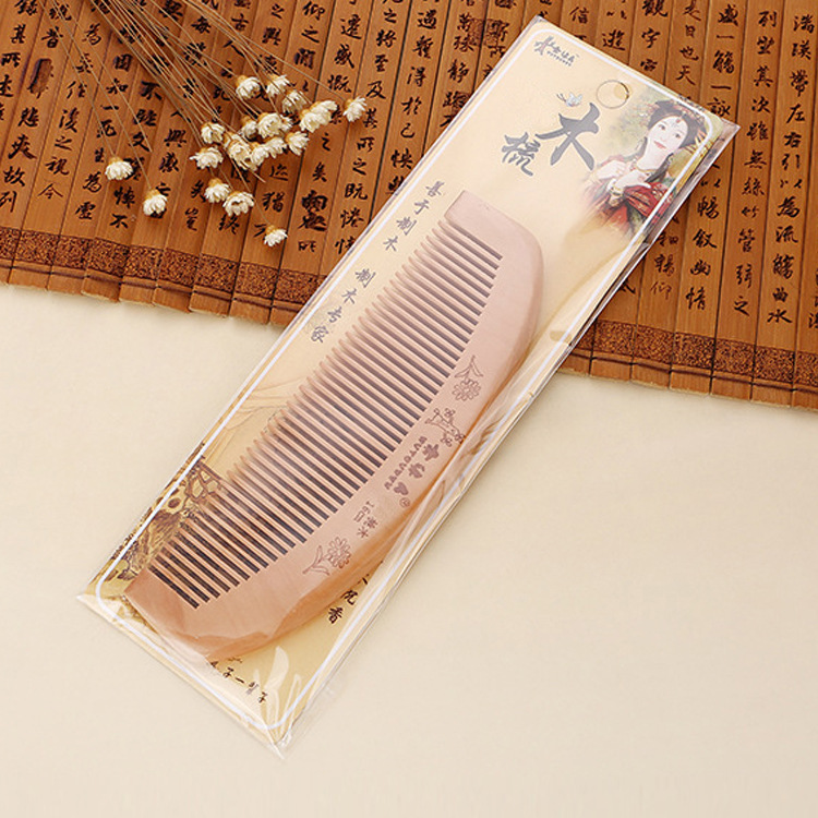 Carved old peach comb men and women home thickened anti-static hair hair hair hair comb wood comb Specification drawing