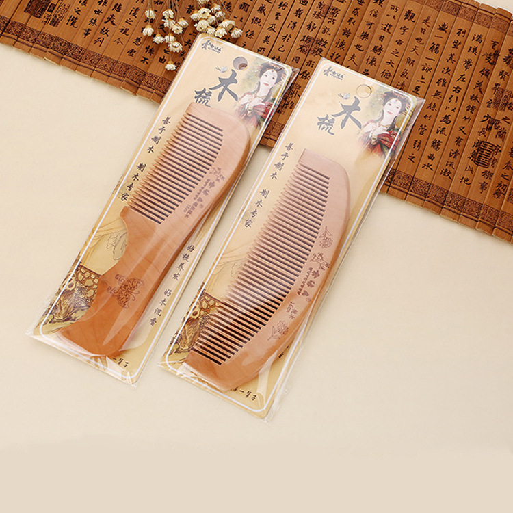 Carved old peach comb men and women home thickened anti-static hair hair hair hair comb wood comb details Picture