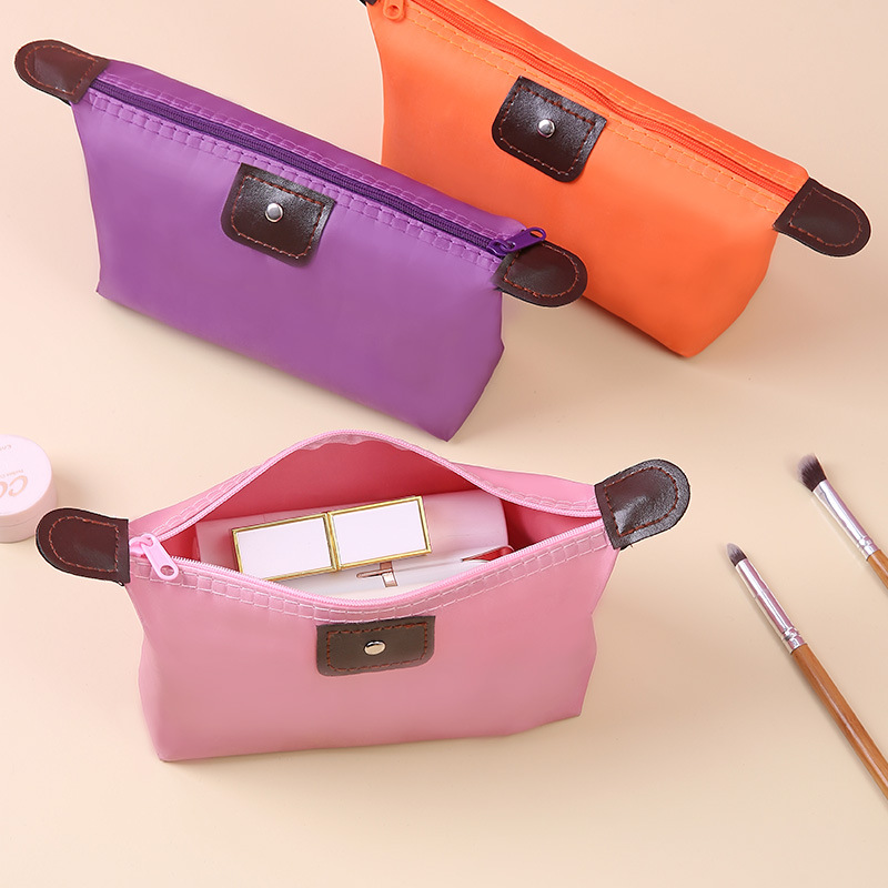 Korean version large capacity dumpling cosmetic bag handbag foldable travel wash storage bag candy colored dumpling bag details Picture