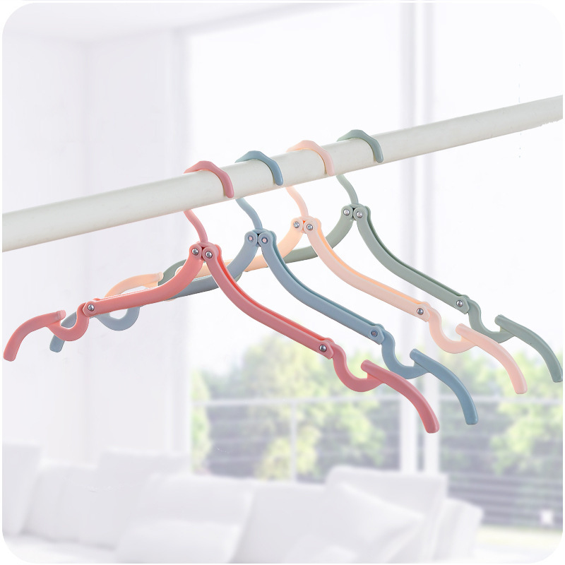 Nordic folding Magic travel coat hanger portable travel non-slip coat hanger plastic clothes hanger Clothes support details Picture