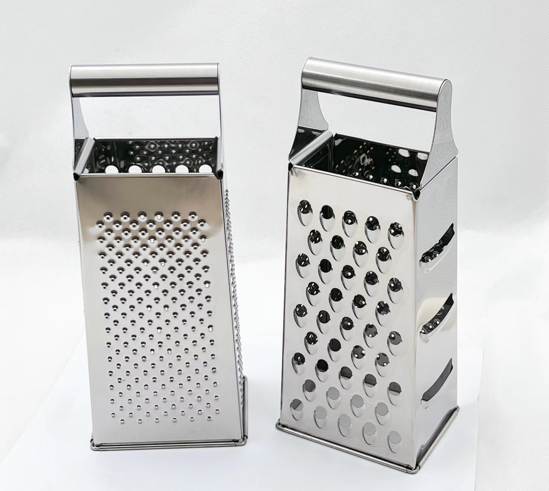 Multi - functional vegetable cutter four - side grater stainless steel cheese cheese grater radish rub fruit grater full figure