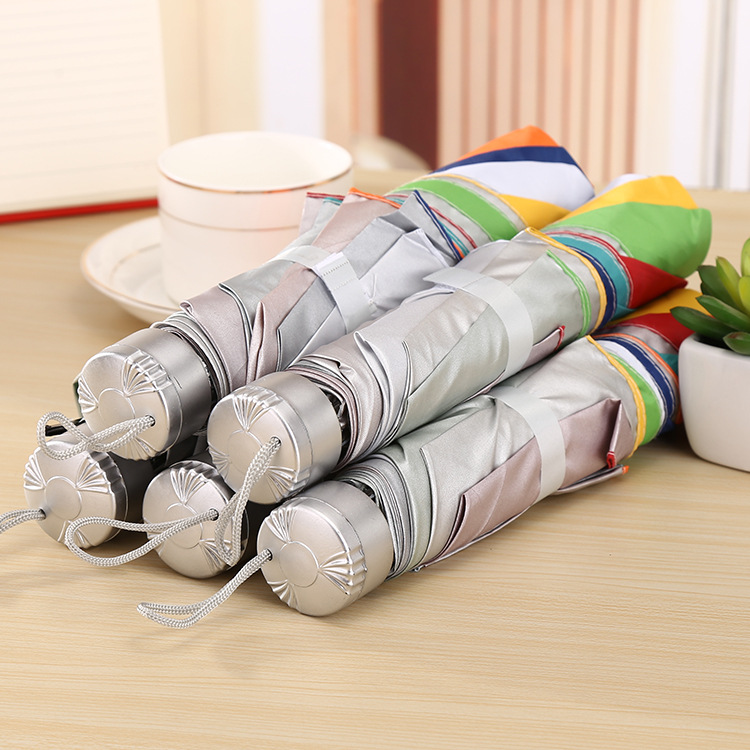 Korean version of creative umbrella manufacturers direct portable rainbow silver glue sunscreen sun umbrella gift AD folding umbrella full figure