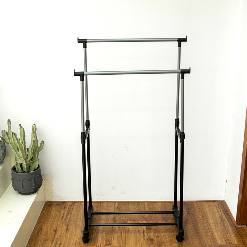 Ordinary iron pipe small lifting clothes hanger floor high and low parallel bar not telescopic clothes rack moving belt wheel details Picture
