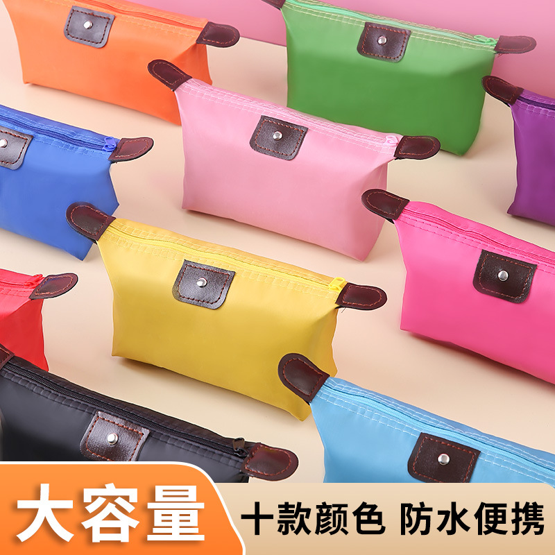 Korean version large capacity dumpling cosmetic bag handbag foldable travel wash storage bag candy colored dumpling bag