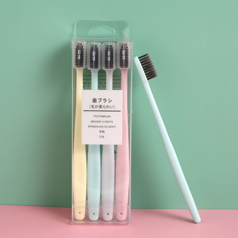 Creative Macaron solid color toothbrush Japanese no print the same adult soft hair 4 toothbrush daily department store manufacturers