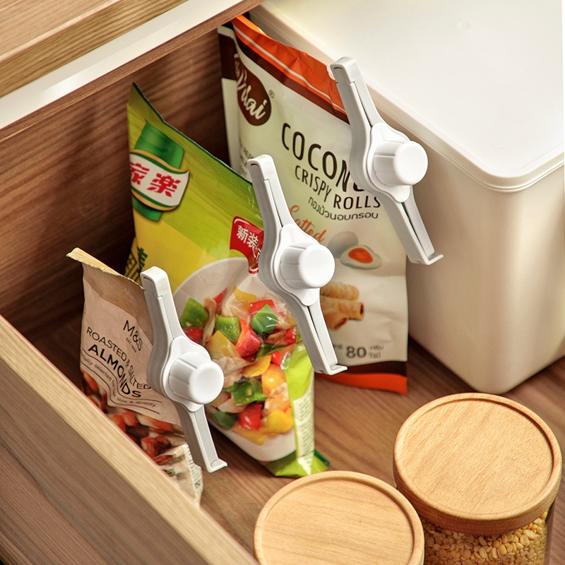 Sealing entrain discharge nozzle Kitchen sealing clip Food snacks food moistureproof milk powder clip refrigerator storage clip