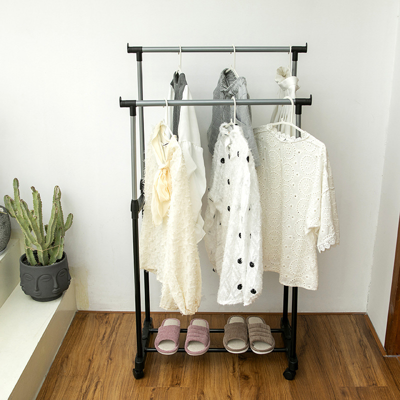 Ordinary iron pipe small lifting clothes hanger floor high and low parallel bar not telescopic clothes rack moving belt wheel